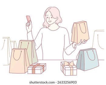 A joyful shopper with bags and a credit card enjoys a colorful array of gifts. Embrace the shopping delight