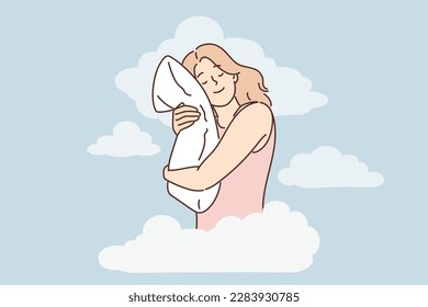 Joyful woman is sleeping and hugging pillow being among clouds symbolizing calmness and night dreams. Positive girl is sleeping and gaining strength before new working day with difficult tasks