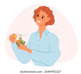 A mulher alegre borrifa perfume em si mesma. Garota usa fragrância em seu corpo. Mulher elegante segurando dispensador de aroma. Presente frasco de pulverizador de cheiro. Perfumaria para fêmeas jovens