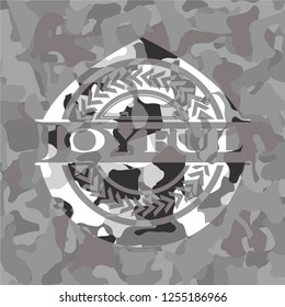 Joyful written on a grey camouflage texture