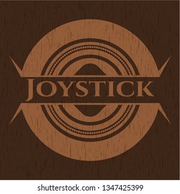 Joystick badge with wooden background