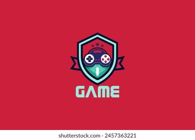 Un logotipo de joystick rodeado por un escudo representa una agencia de deportes que se dedica a los juegos de equipo mediante la creación de jugadores talentosos para entrar en el mundo de los juegos profesionales.