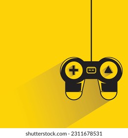 joystick con sombra sobre fondo amarillo