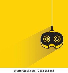joystick con sombra sobre fondo amarillo