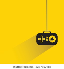 joystick con sombra sobre fondo amarillo