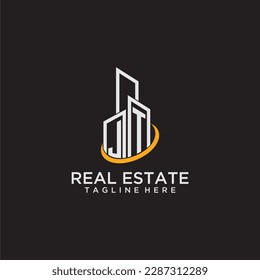 JT initial monogram logo for real estate with building style
