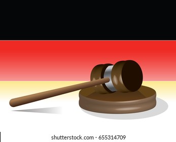 judge's gavel with German flag as a background