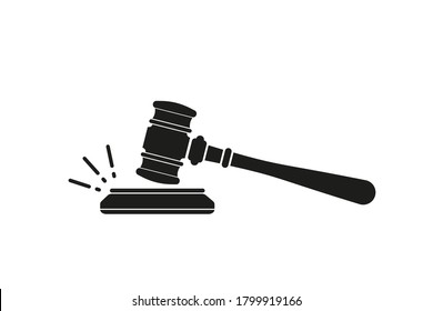 Judge's gavel. Judges gavel hammer for adjudication of sentences and bills, with a wooden stand. Law and justice concept. Wooden auction hammer