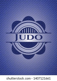 Judo emblem with jean background. Vector Illustration. Detailed.