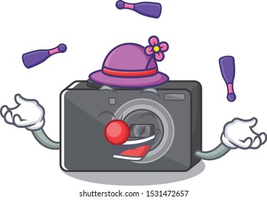 Juggling digital camera on a cartoon table