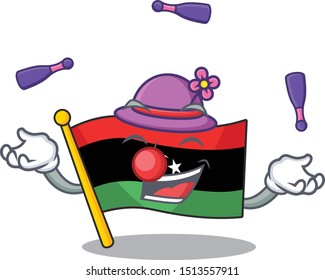 Juggling flag libya clings to mascot wall