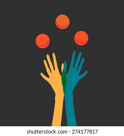 Juggling two hands in colorful gloves