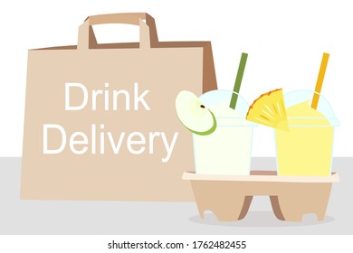 The Juice Smoothies cup with fruit on top (apple, pineapple)​ and the paper bag with text. Home delivery concept.​ Take a way Beverages. Cool summer drink. Organic and healthy food. 