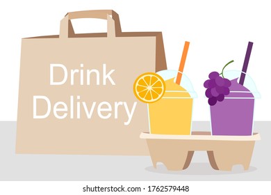 The Juice Smoothies cup with fruit on top (grape, orange)​ and the paper bag with text. Home delivery concept.​ Take a way Beverages. Cool summer drink. Organic and healthy food. 