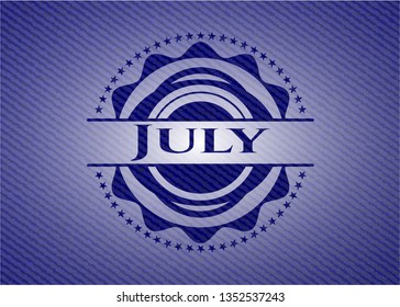 July emblem with jean background