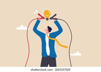 Jump start new business idea, knowledge to solve problem or creativity to think about solution concept, businessman connect electricity to lightbulb idea to lit up bright metaphor of solution idea.