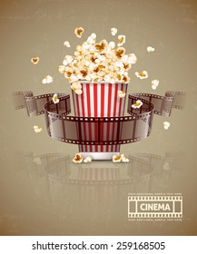 Jumping Popcorn And Movie Film Tape. Eps10 Vector Illustration. Isolated On White Background