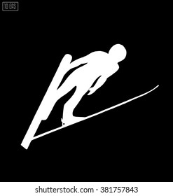 Jumping skier silhouette on black background. Winter Sport.