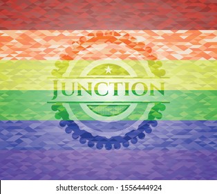 Junction emblem on mosaic background with the colors of the LGBT flag