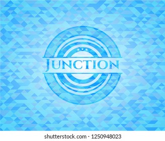Junction light blue emblem with mosaic background