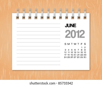 June calendar 2012 on wood background
