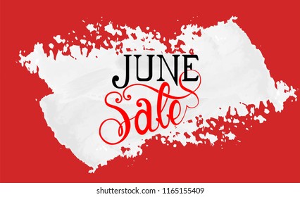 June Sale text made with custom made font and lettering on white painted red wall