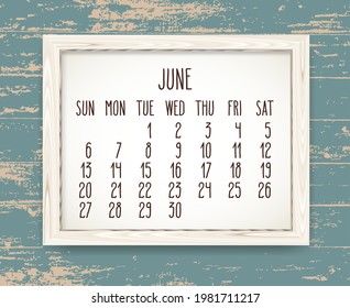 June year 2021 vector monthly calendar. Week starting from Sunday. Hand drawn text in a wooden frame over rustic distressed teal wood background.