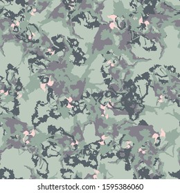 Jungle camouflage of various shades of green, grey and pink colors. It is a colorful seamless pattern that can be used as a camo print for clothing and background and backdrop or computer wallpaper