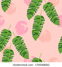 Jungle leaves on pink background seamless pattern. Vector illustration.