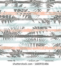 Jungle new zealand fern frond and bracken grass over painted stripes seamless pattern design. Bali jungle foliage summer fashion print. Tropical leaves and stripes seamless.