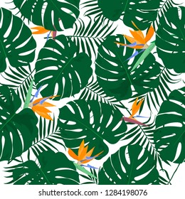 Jungle tropical seamless pattern. Hand-drawn green palm leaves and tropical flowers. Template for design, postcards, print, poster, party, template, summer background, vintage textile. Vector.	