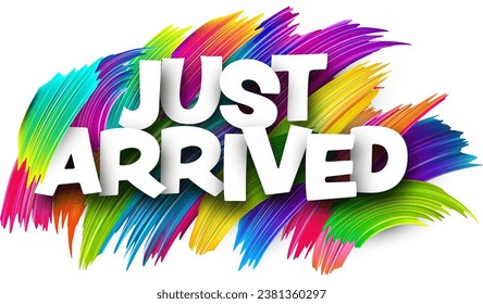 Just arrived paper word sign with colorful spectrum paint brush strokes over white. Vector illustration.