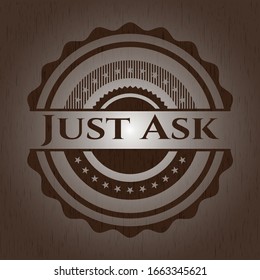 Just Ask badge with wooden background