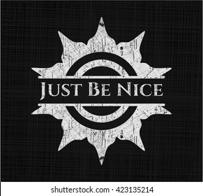 Just Be Nice chalk emblem written on a blackboard