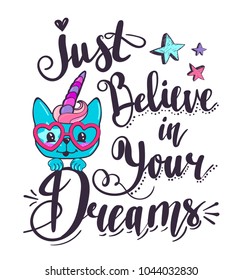 Just Believe In Your Dreams. Unicorn Kitty T Shirt Design With Stars And Calligraphic Lettering Composition.  Motivation Tagline. Cartoon Cat Face With Heart Glasses, Horn, Pink Hair, Swirly Bangs. 