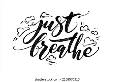 Just breathe quote. Modern calligraphy text with hand drawn clouds around. Design print for t shirt, pin label, badges, sticker, greeting card, banner.