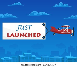 Just Launched banner is attached to the airplane. Vector illustration