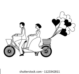 just married couple in bicycle and balloons helium with shape heart