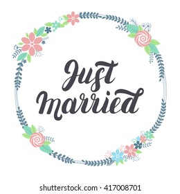 Just married lettering with floral wreath. Hand written lettering for design wedding invitation. Wedding card.