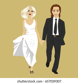Just married young couple holding hands together walking. Front view