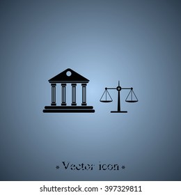 Justice court building with scales of justice.