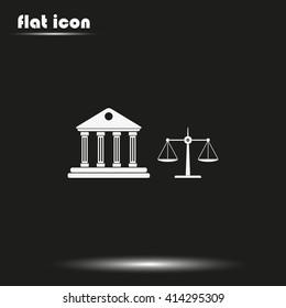 Justice court building with scales of justice.