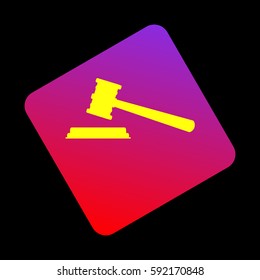 Justice hammer sign. Vector. Yellow icon at violet-red gradient square with rounded corners rotated for dynamics on black background.