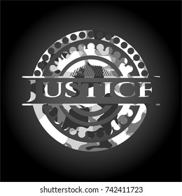 Justice on grey camouflage texture