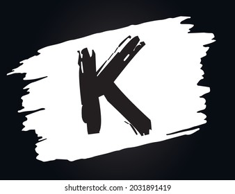 K - Alphabet with brush effect and black background.