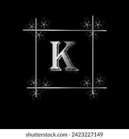 K alphabet design with gradient silver color and black background