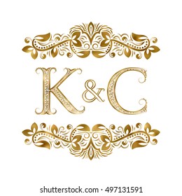 K and C vintage initials logo symbol. The letters are surrounded by ornamental elements. Wedding or business partners monogram in royal style.