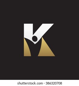 K initial alphabet letter logo with negative space swoosh man, silver gold black background