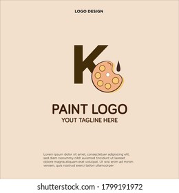 K initial logo design with palette and paint brush