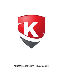 K initial swoosh shield logo red